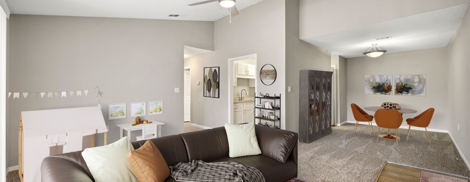 a living room with a couch and a table